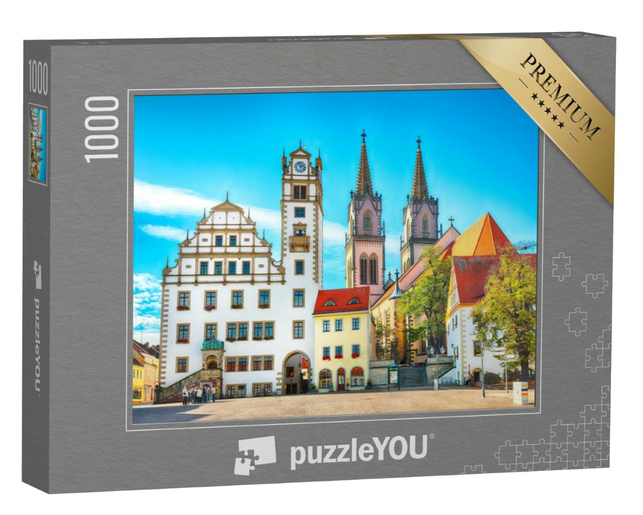 Puzzle 1000 Teile „Stadtbild des Oschatzer Hauptplatzes mit Stadtverwaltung und St. Aegidien, Sachsen“