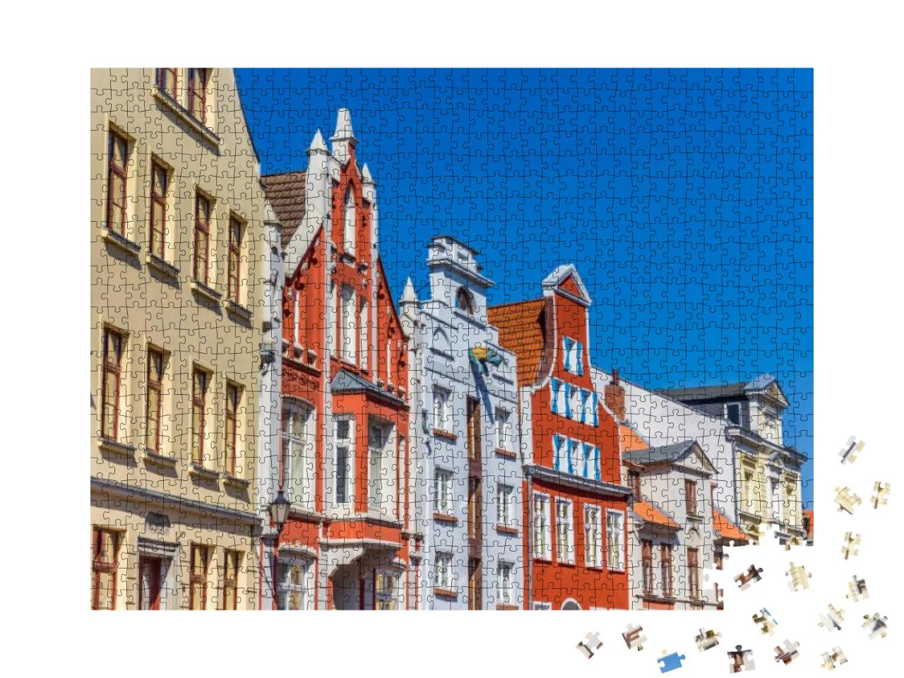 Puzzle 1000 Teile „Historische Fassaden in der Innenstadt von Wismar, Deutschland“