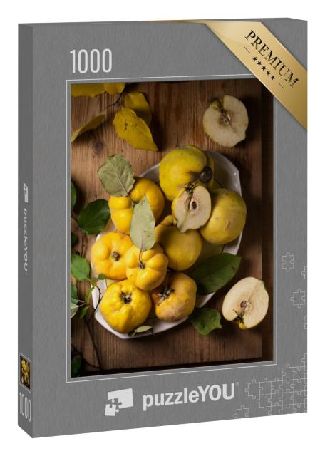 Puzzle 1000 Teile „Reife große Quittenfrüchte auf einem Teller“