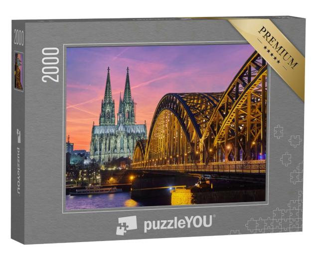Puzzle 2000 Teile „Kölner Dom und Hohenzollernbrücke bei Sonnenuntergang“