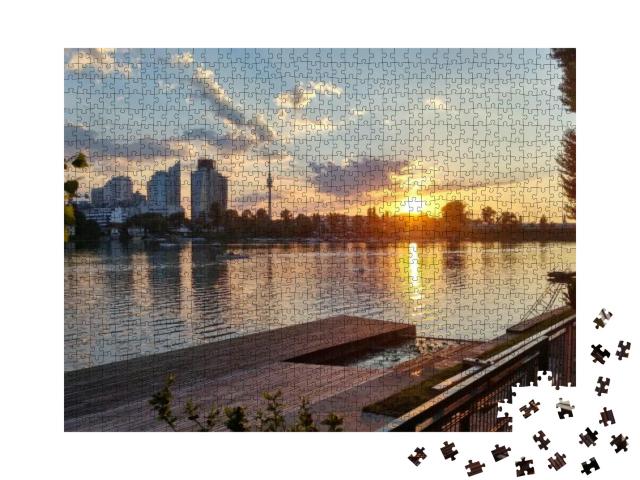 Puzzle 1000 Teile „Wien: alte Donau bei Sonnenuntergang“