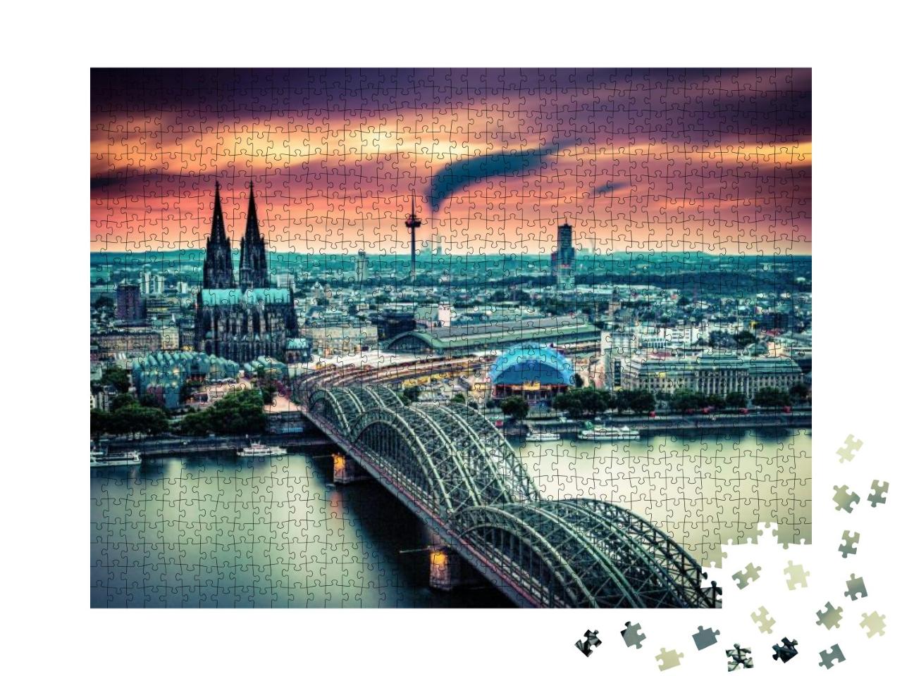 Puzzle 1000 Teile „Sonnenuntergang und bewegte Wolken über Köln, Deutschland“