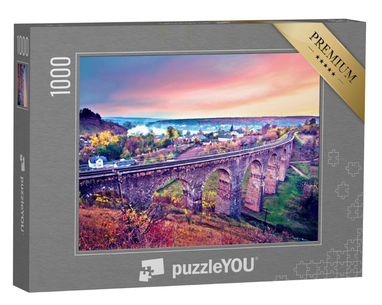 Puzzle 1000 Teile „Herbstlandschaft mit Viadukt und Eisenbahnstrecke bei Sonnenuntergang, Ukraine“
