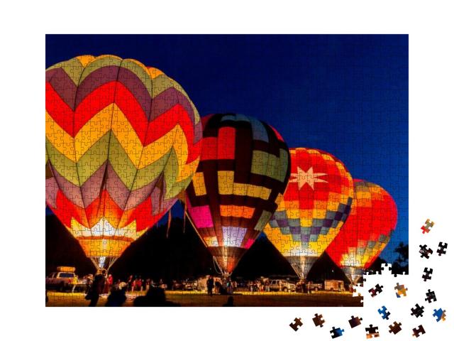 Puzzle 1000 Teile „Heißluftballons vor dem Start in der Morgendämmerung“