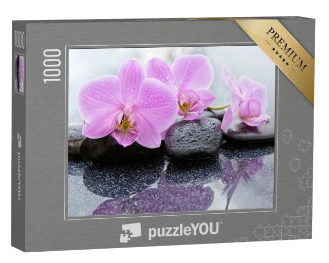 Puzzle 1000 Teile „Zartrosa Orchideenblüten auf nassen Kieselsteinen“