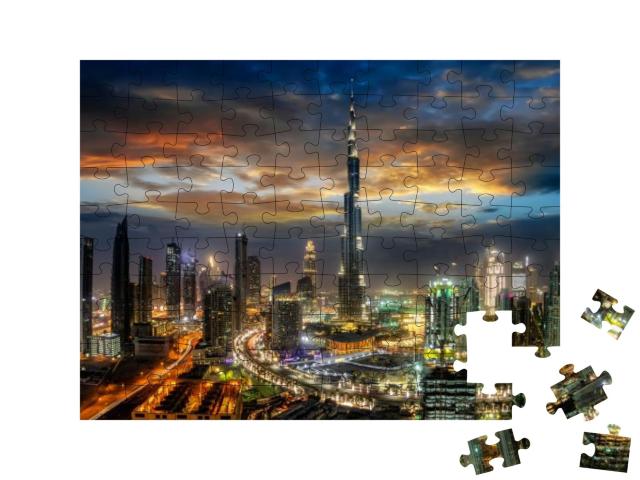 Puzzle 100 Teile „Dubai Business Bay bei Nacht“
