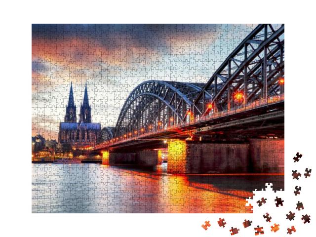 Puzzle 1000 Teile „Kölner Dom und Hohenzollernbrücke im Sonnenuntergang“