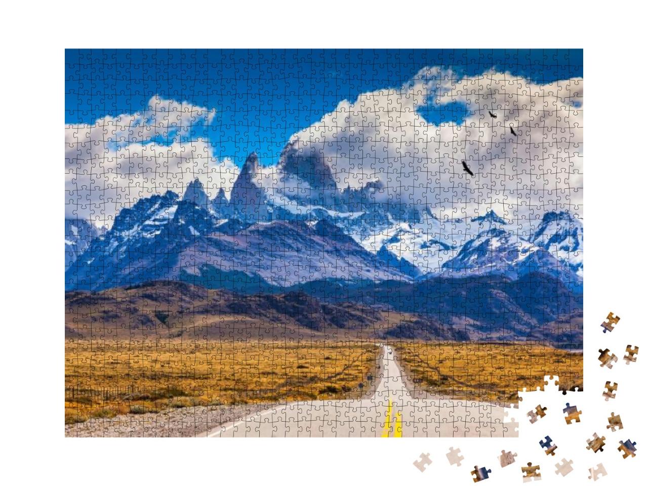 Puzzle 1000 Teile „Schar von Andenkondoren über einem Highway in Patagonien“