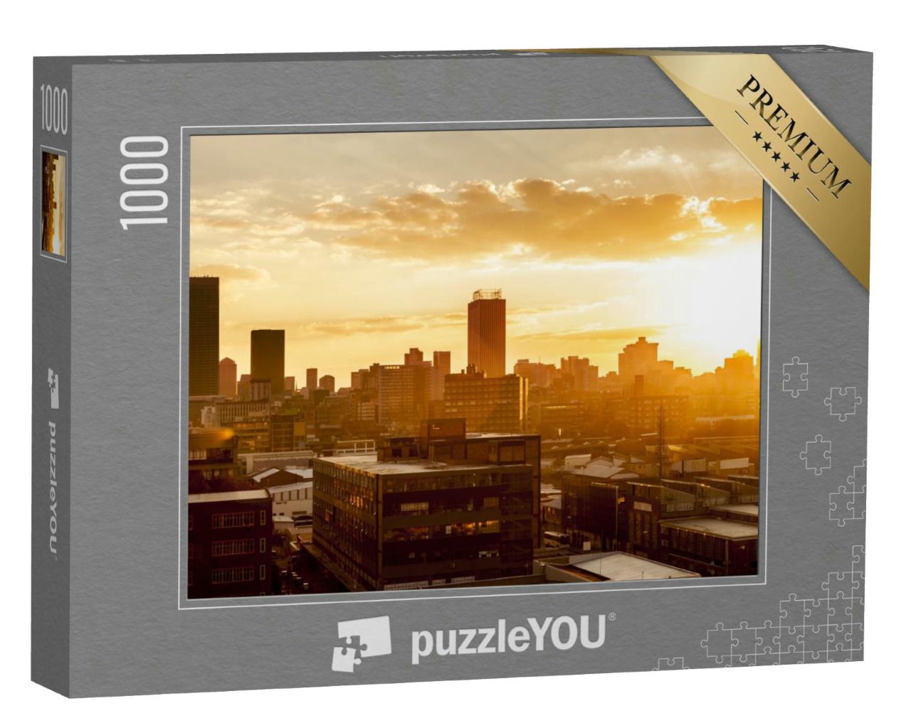 Puzzle 1000 Teile „Stadt im heißen Sonnenuntergang“