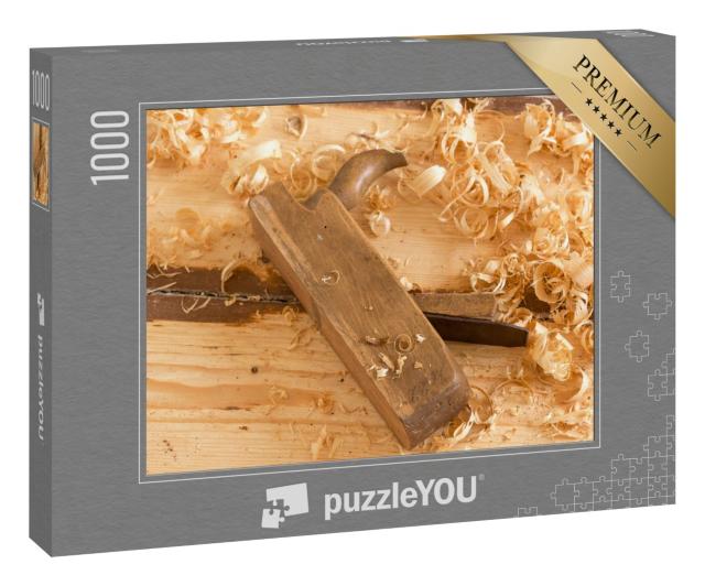 Puzzle 1000 Teile „Ausrangierter alter Holzhandhobel für die Holzbearbeitung mit Holzspänen.“