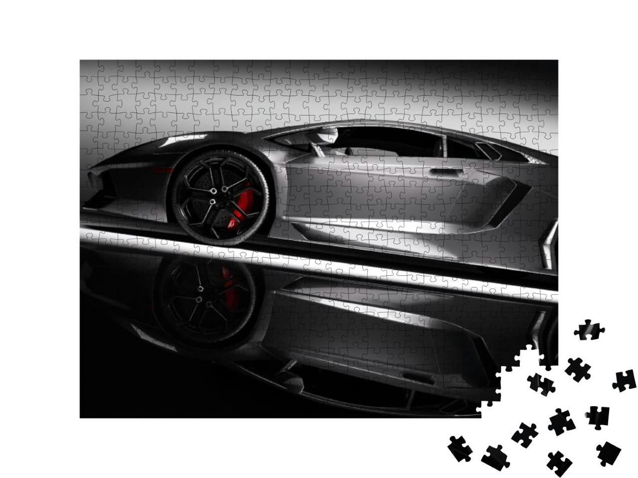 Puzzle 500 Teile „Grauer schneller Sportwagen im Scheinwerferlicht“