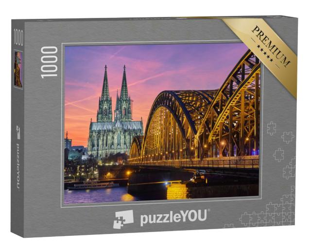 Puzzle 1000 Teile „Kölner Dom und Hohenzollernbrücke bei Sonnenuntergang“