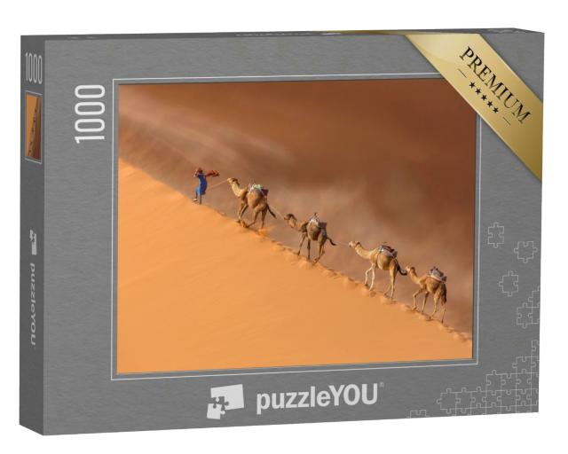 Puzzle 1000 Teile „Kameltreiber führt eine Kamelkarawane in der Wüste Sahara während eines Wüstensturms“