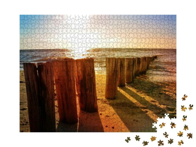 Puzzle 1000 Teile „Hölzerne Buhnen am Nordseestrand bei Sonnenuntergang“