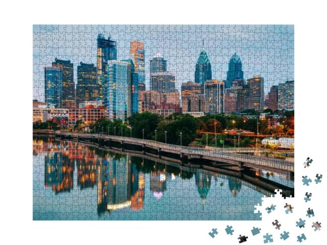 Puzzle 1000 Teile „Skyline von Philadelphia bei Nacht mit Fluss Schuylkill“