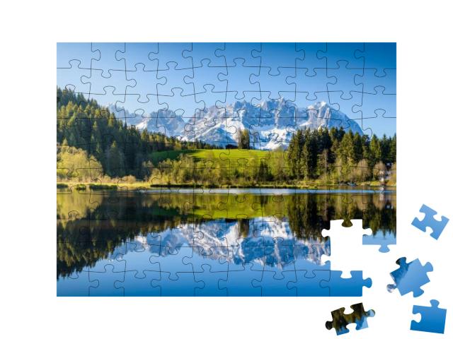 Puzzle 100 Teile „Idyllische Alpenlandschaft“