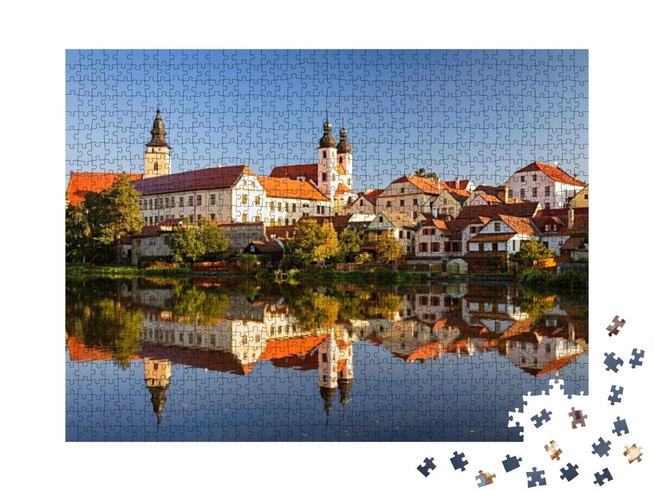 Puzzle 1000 Teile „Blick auf Telc über den Teich mit Reflexionen, Südmähren, Tschechische Republik.“