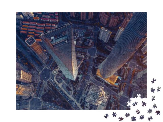 Puzzle 1000 Teile „Blick von oben in die Tiefe: Wolkenkratzer in Schanghai“