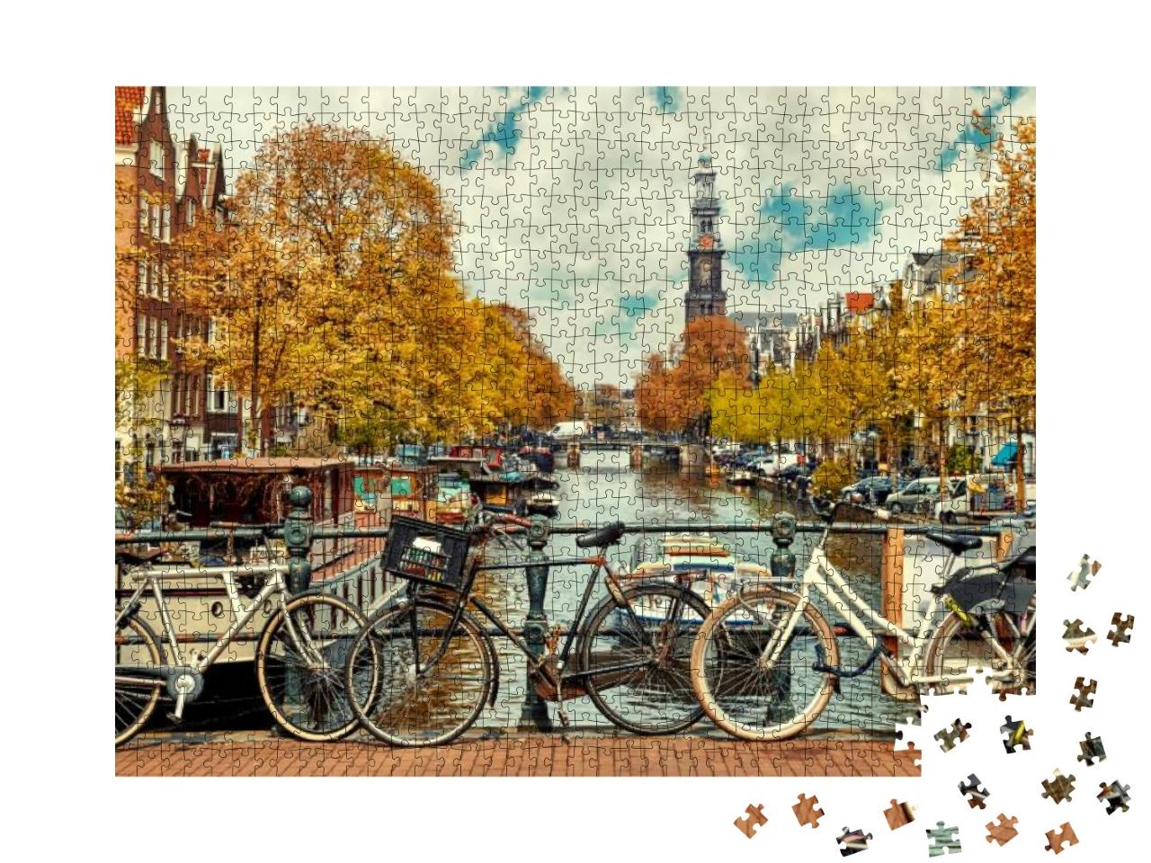 Puzzle 1000 Teile „Fahrräder an der Amstel in Amsterdam“