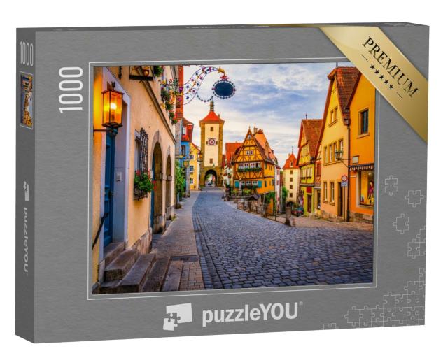 Puzzle 1000 Teile „Morgenansicht der Unteren Schmiedgasse, Rothenburg ob der Tauber, Bayern“