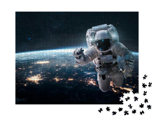 Puzzle 1000 Teile „Astronaut schwebt über der Erde bei Nacht“