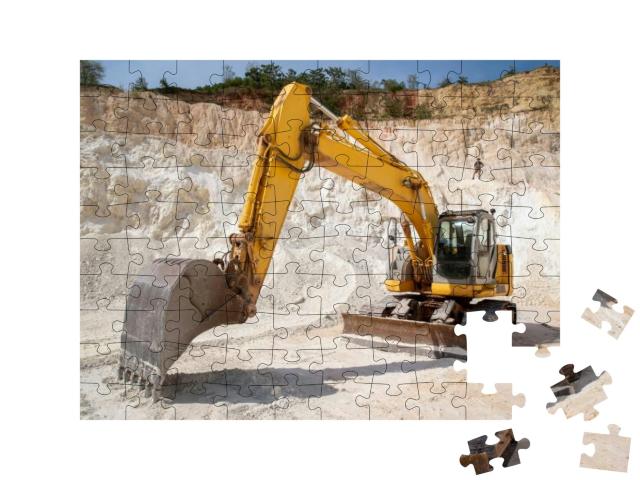 Puzzle 100 Teile „Hydraulischer Raupenbagger bei der Arbeit, Steinbruch“