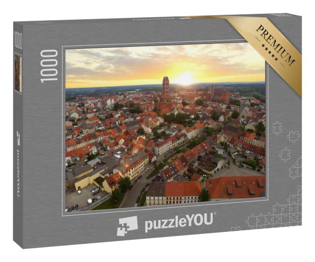 Puzzle 1000 Teile „Historische Hansestadt Wismar im Sonnenuntergang“