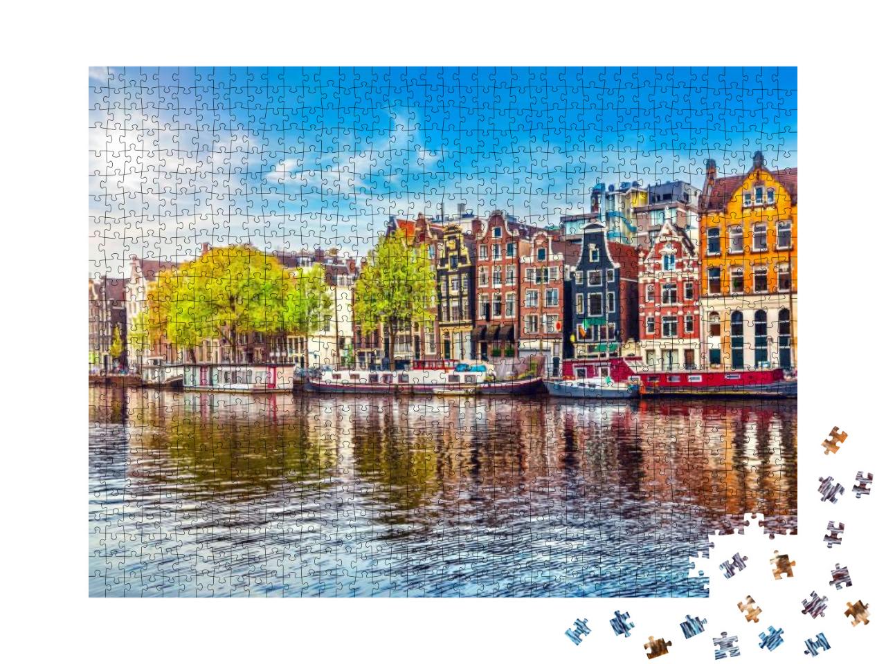 Puzzle 1000 Teile „Tanzende Häuser am Fluss Amstel in Amsterdam, Niederlande“
