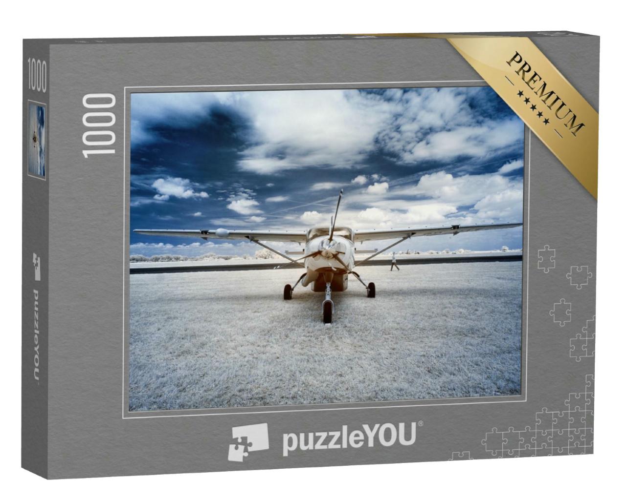 Puzzle 1000 Teile „Propellermaschine auf einer Wiese“
