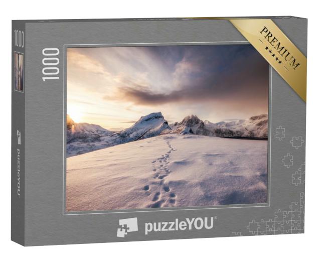 Puzzle 1000 Teile „Spuren im Schnee beim Sonnenaufgang in den Bergen“