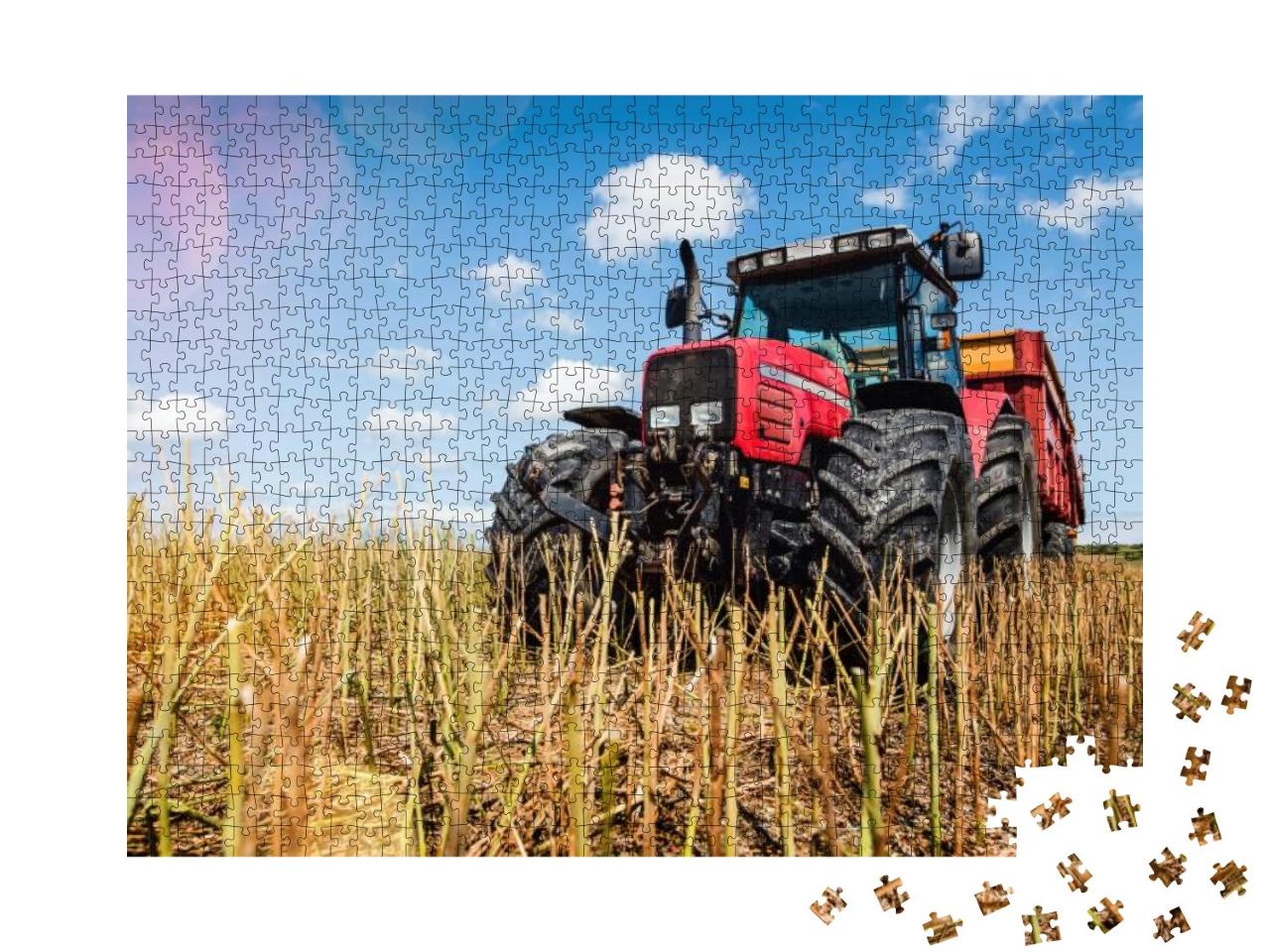Puzzle 1000 Teile „Prächtige Ansicht eines Traktors mit Anhänger in einem abgeernteten Rapsfeld“