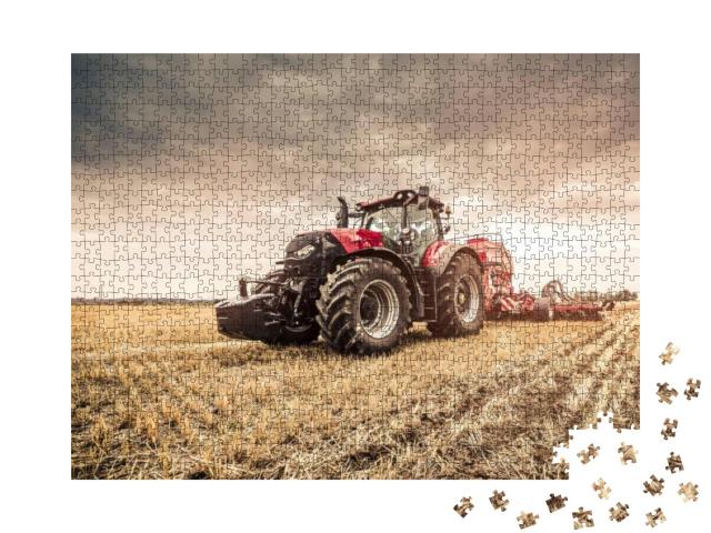 Puzzle 1000 Teile „Roter Traktor bei der Feldarbeit“