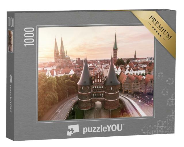 Puzzle 1000 Teile „Holstentor der Hansestadt Lübeck bei Sonnenaufgang“