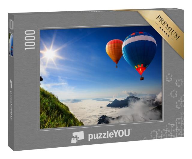Puzzle 1000 Teile „Bunte Heißluftballons über Berggipfeln im Nebel“