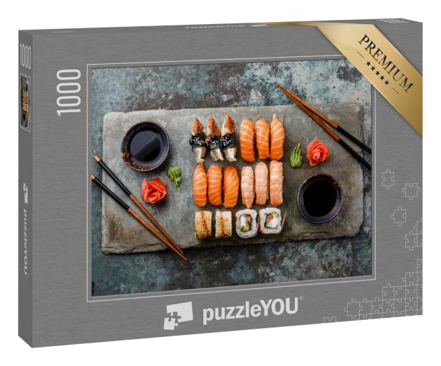 Puzzle 1000 Teile „Sushi-Set Sashimi und Sushi-Rollen, serviert auf Steinschiefer“