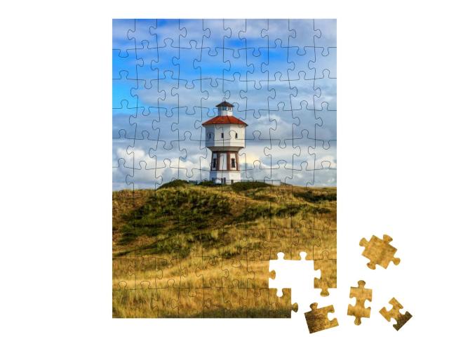 Puzzle 100 Teile „Leuchtturm auf der Insel Langeoog, Niedersachsen“