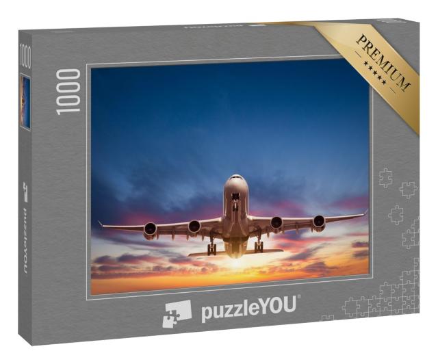 Puzzle 1000 Teile „Passagierflugzeug auf dem Flug in den  Sonnenuntergang“
