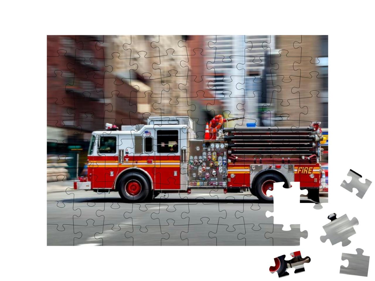 Puzzle 100 Teile „Feuerwehrauto auf dem Weg zum Einsatz in NYC“
