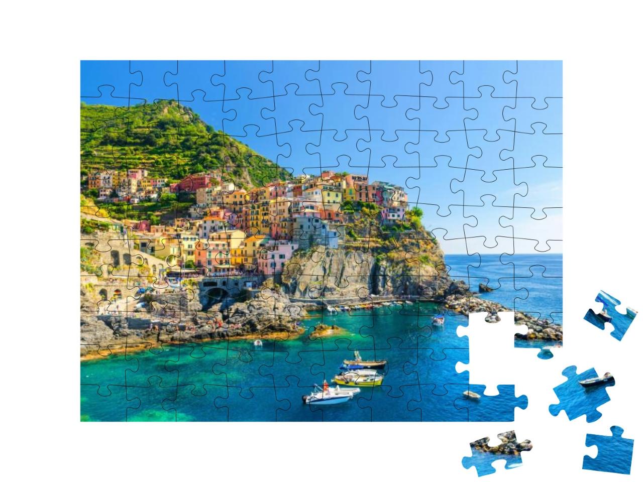 Puzzle 100 Teile „Manarola traditionelles typisch italienisches Dorf im Nationalpark Cinque Terre“
