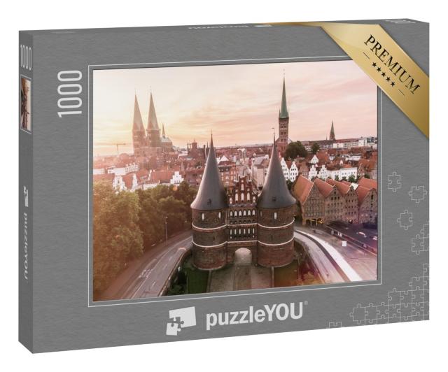 Puzzle 1000 Teile „Holstentor der Hansestadt Lübeck bei Sonnenaufgang“