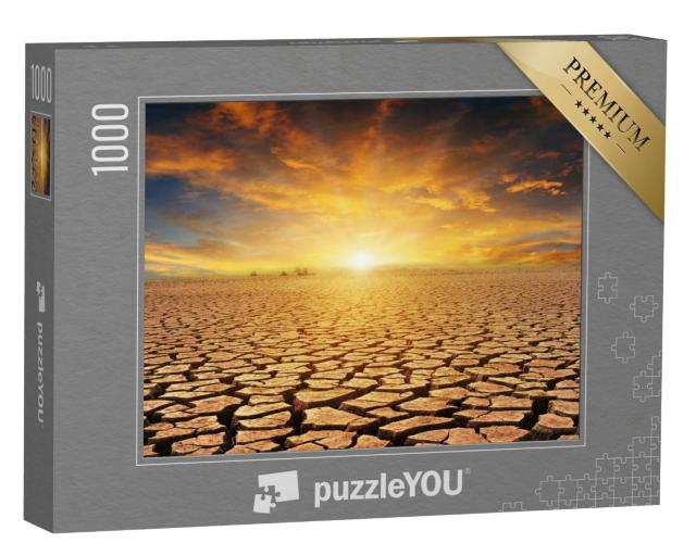 Puzzle 1000 Teile „Orangefarbener bewölkter Sonnenuntergang über Steinwüste“