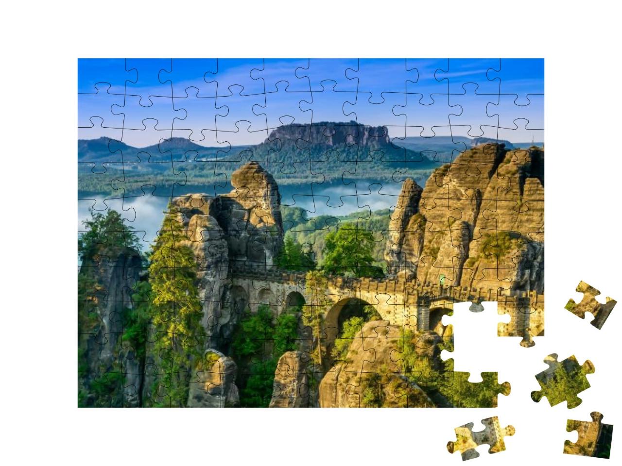 Puzzle 100 Teile „Sonnenaufgang an der Bastei in der Sächsischen Schweiz, Deutschland“