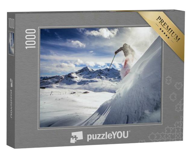 Puzzle 1000 Teile „Skifahrer, der einen steilen Hang hinunterfährt, blauer Himmel und Berge“