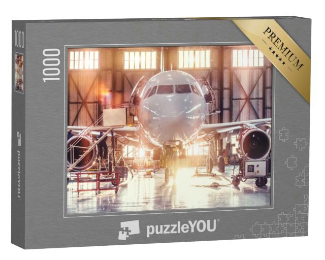 Puzzle 1000 Teile „Flugzeugreparatur im Hangar“