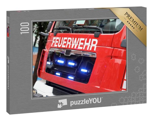 Puzzle 100 Teile „Deutsches Feuerwehrauto in Aktion“