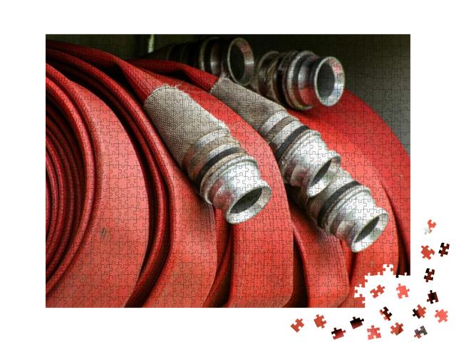 Puzzle 1000 Teile „Aufgerollter Feuerwehrschlauch“
