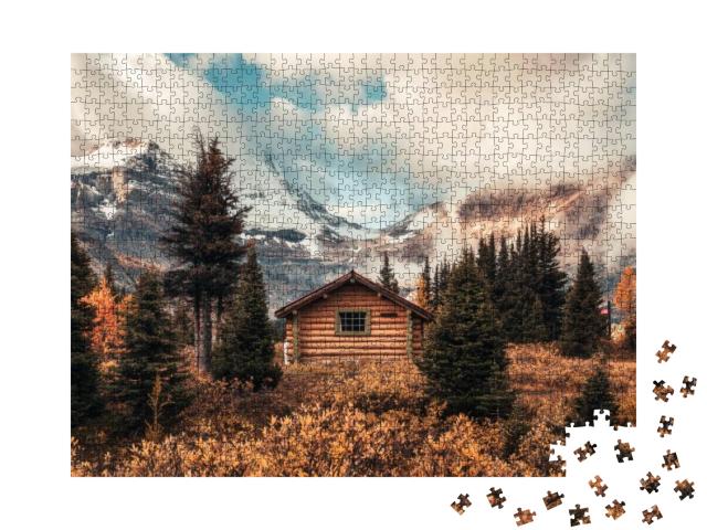 Puzzle 1000 Teile „Holzhütte auf dem Assiniboine-Berg im Herbstwald im Provinzpark, Kanada“