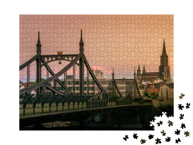 Puzzle 1000 Teile „Die Brücke Neutor und Ulmer Münster im Sonnenuntergang“