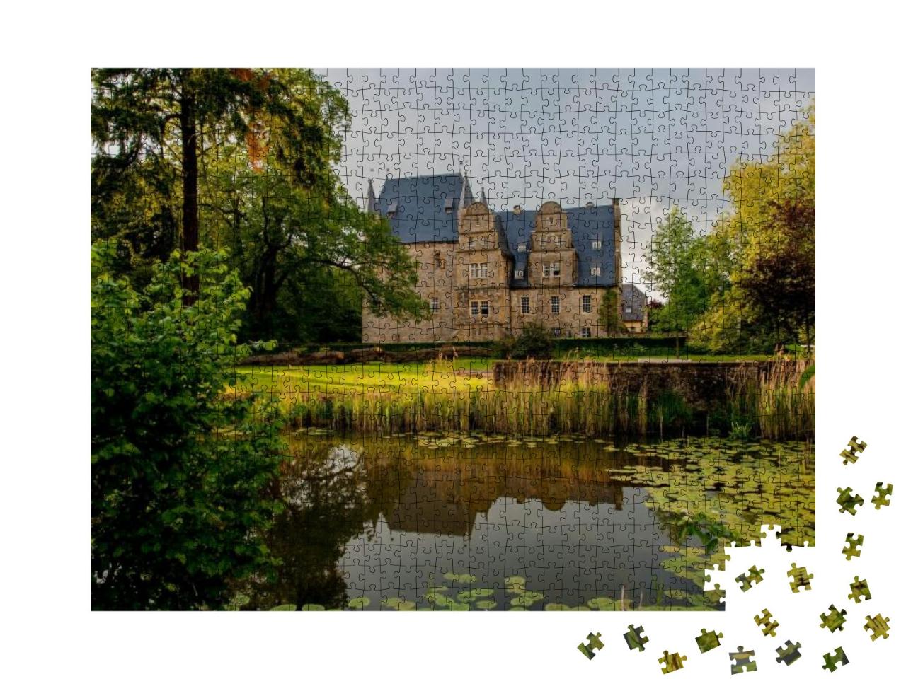 Puzzle 1000 Teile „Schelenburg im Landkreis Osnabrück umgeben von idyllischem Park“