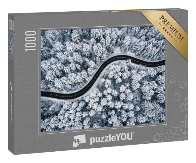 Puzzle 1000 Teile „Vogelperspektive: Kurvenreiche Straße im schneebedeckten Wald“